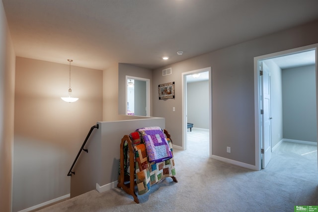 6311 N 169th St, Omaha, NE 68116 - hall featuring an upstairs landing, light colored carpet, baseboards, and recessed lighting