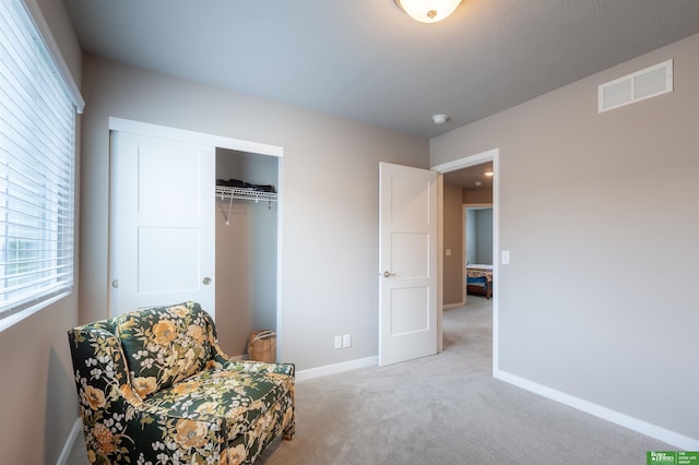 6311 N 169th St, Omaha, NE 68116 - living area featuring light carpet and baseboards