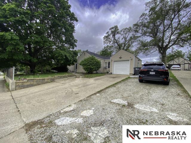 4816 N 60th St, Omaha, NE 68104 - view of front facade with driveway
