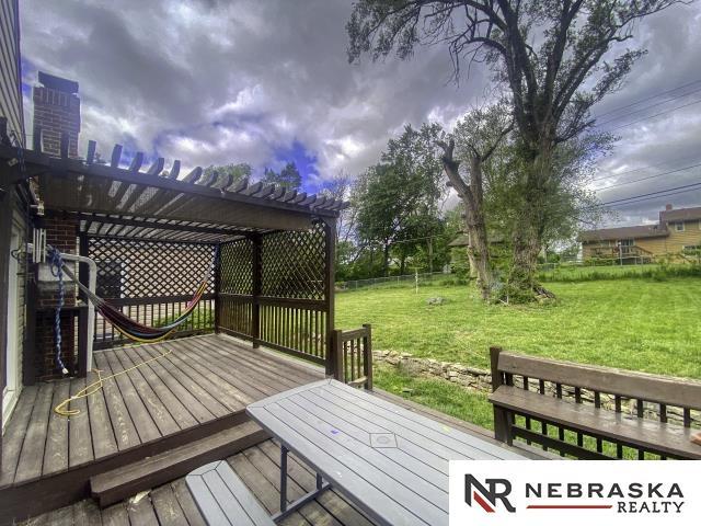 4816 N 60th St, Omaha, NE 68104 - wooden deck with a pergola