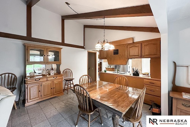 6251 Nebraska Ave, Omaha, NE 68104 - dining area with beamed ceiling, a chandelier, and high vaulted ceiling