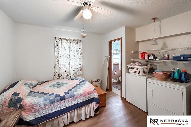 6251 Nebraska Ave, Omaha, NE 68104 - bedroom featuring separate washer and dryer, wood finished floors, and a ceiling fan