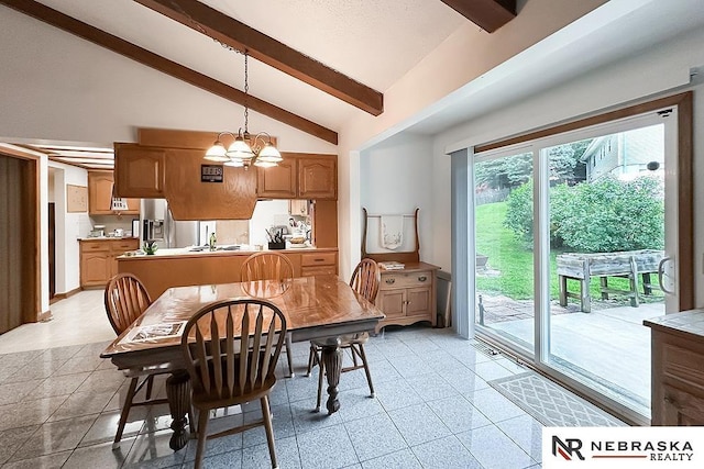 6251 Nebraska Ave, Omaha, NE 68104 - dining space with beamed ceiling, a chandelier, and high vaulted ceiling