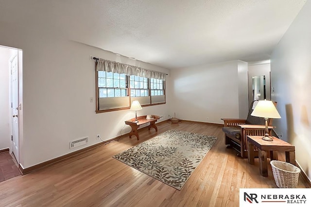 6251 Nebraska Ave, Omaha, NE 68104 - sitting room with wood finished floors and baseboards