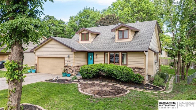 15341 Davenport Cir, Omaha, NE 68154 - new england style home with brick siding, roof with shingles, driveway, and a garage