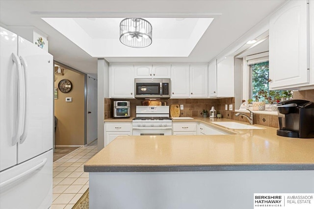 15341 Davenport Cir, Omaha, NE 68154 - kitchen featuring white appliances, a sink, light tile patterned flooring, white cabinets, and backsplash