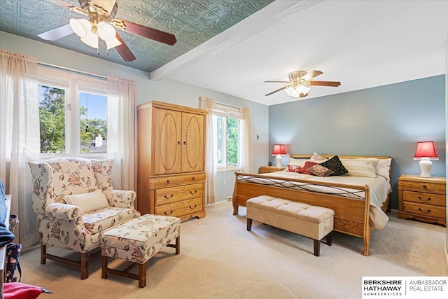 15341 Davenport Cir, Omaha, NE 68154 - bedroom featuring light colored carpet, a ceiling fan, baseboards, and beamed ceiling
