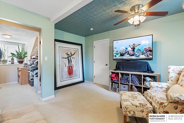 15341 Davenport Cir, Omaha, NE 68154 - carpeted living area featuring baseboards and ceiling fan