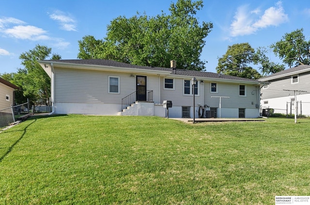 4314 Oak St, Omaha, NE 68105 - rear view of house featuring a chimney