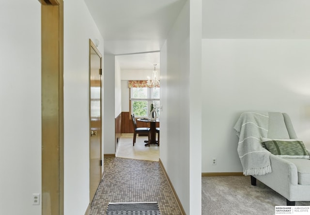4314 Oak St, Omaha, NE 68105 - corridor with a chandelier and baseboards