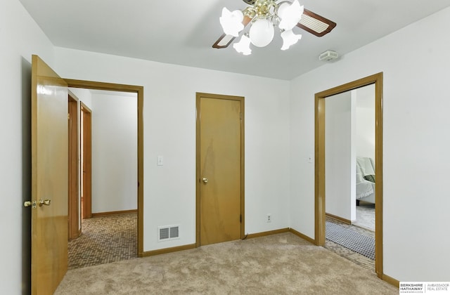 4314 Oak St, Omaha, NE 68105 - unfurnished bedroom featuring carpet, baseboards, and ceiling fan