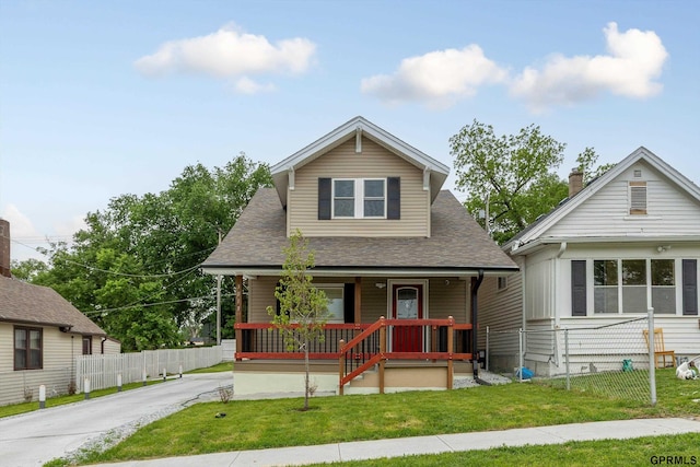 3013 Decatur St, Omaha, NE 68111 - bungalow-style house featuring covered porch and a shingled roof