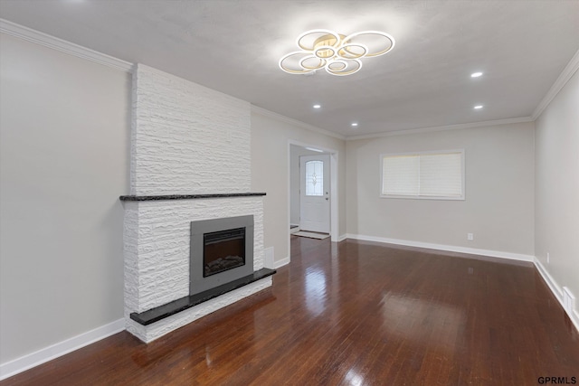 3013 Decatur St, Omaha, NE 68111 - unfurnished living room with ornamental molding, wood finished floors, a fireplace, baseboards, and recessed lighting