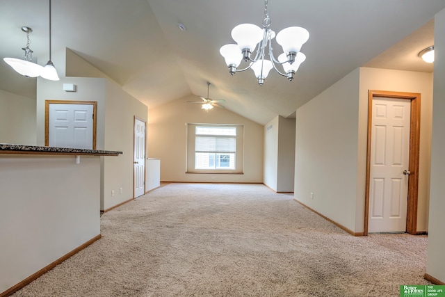 6200 Maple View Dr, Lincoln, NE 68512 - unfurnished living room with carpet floors, a chandelier, baseboards, vaulted ceiling, and ceiling fan