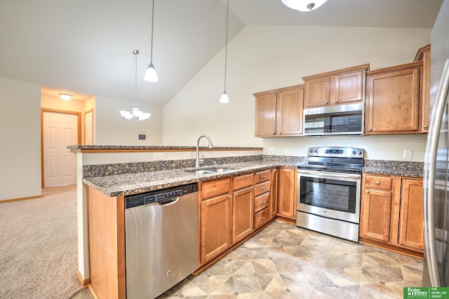 6200 Maple View Dr, Lincoln, NE 68512 - kitchen featuring stainless steel appliances, a sink, a peninsula, dark stone countertops, and high vaulted ceiling