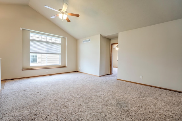 6200 Maple View Dr, Lincoln, NE 68512 - unfurnished room featuring light colored carpet, ceiling fan, vaulted ceiling, and baseboards