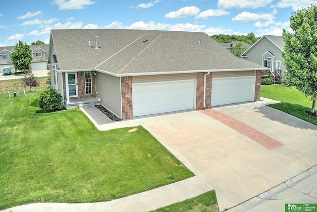 6200 Maple View Dr, Lincoln, NE 68512 - view of front of property with roof with shingles, brick siding, an attached garage, and concrete driveway