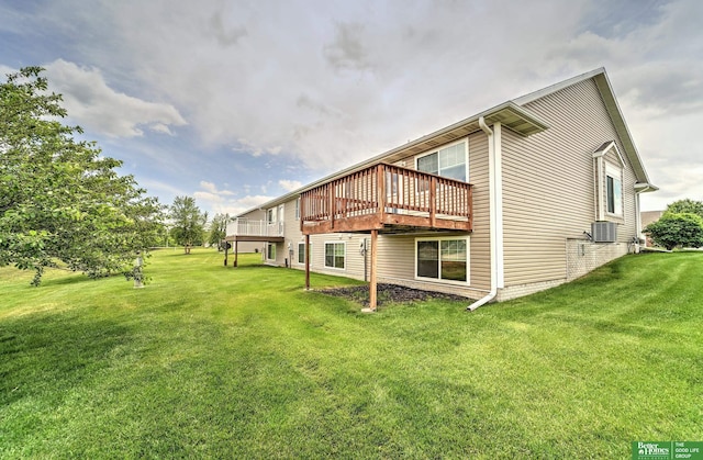 6200 Maple View Dr, Lincoln, NE 68512 - back of house featuring a lawn, a deck, and central AC unit