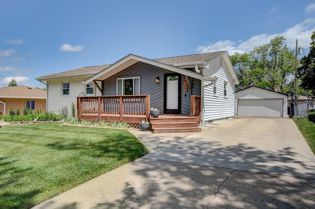 4705 N 95th St, Omaha, NE 68134 - view of front facade with an outbuilding, a detached garage, a front yard, and a shingled roof