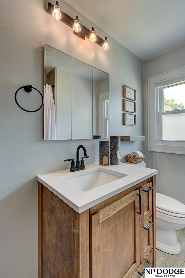 4705 N 95th St, Omaha, NE 68134 - bathroom featuring vanity and toilet
