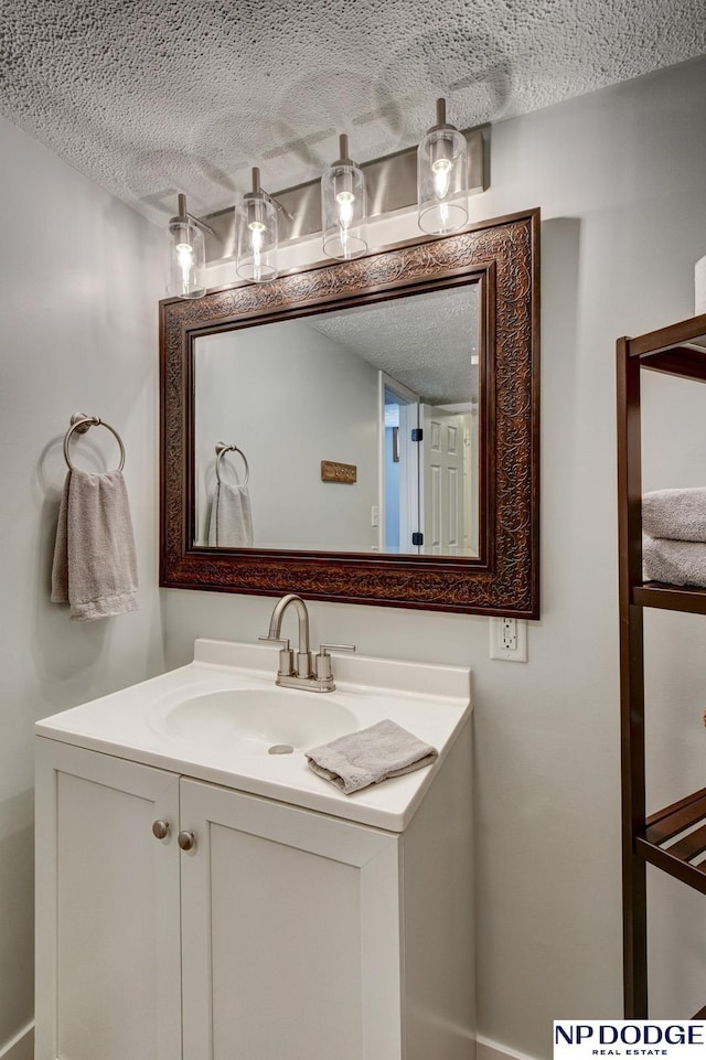 4705 N 95th St, Omaha, NE 68134 - bathroom with vanity and a textured ceiling
