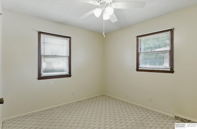 128 S 110th St, Omaha, NE 68154 - empty room with carpet flooring, baseboards, and ceiling fan