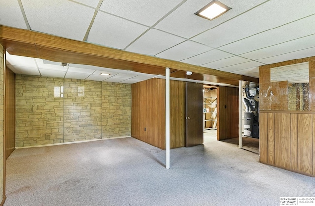 128 S 110th St, Omaha, NE 68154 - finished below grade area with a drop ceiling and wooden walls