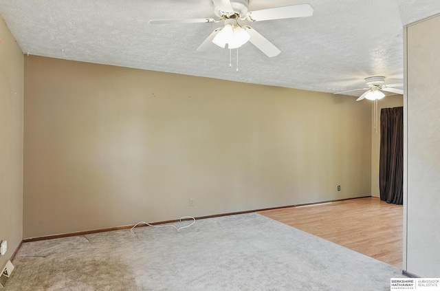 128 S 110th St, Omaha, NE 68154 - unfurnished room featuring ceiling fan, a textured ceiling, baseboards, and carpet flooring