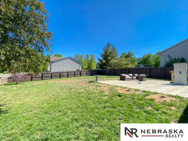 14603 Nebraska Cir, Omaha, NE 68116 - view of yard featuring a patio