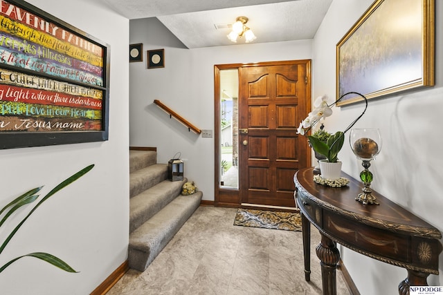 13952 Frederick Cir, Omaha, NE 68138 - foyer featuring stairs and baseboards
