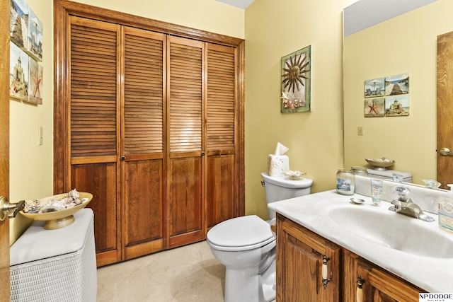 13952 Frederick Cir, Omaha, NE 68138 - bathroom featuring vanity, a closet, and toilet