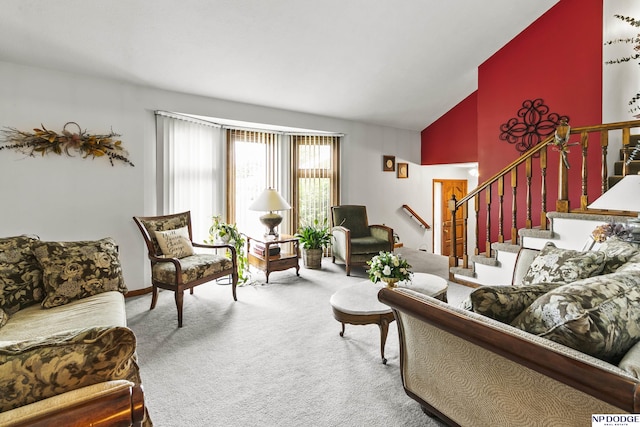 13952 Frederick Cir, Omaha, NE 68138 - carpeted living area featuring lofted ceiling and stairway