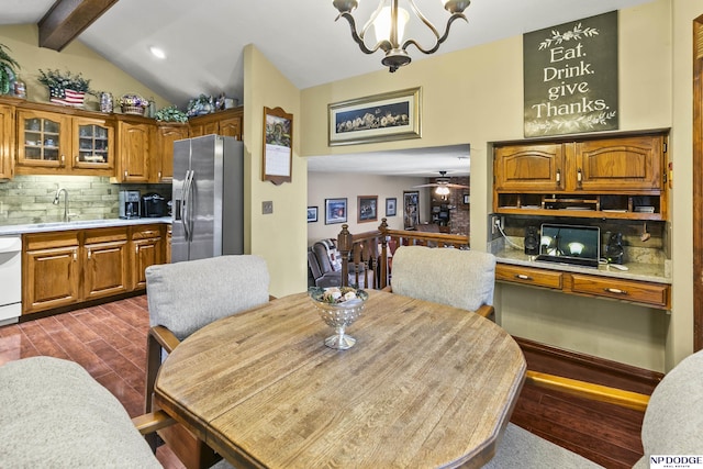13952 Frederick Cir, Omaha, NE 68138 - dining area with dark wood-type flooring, a chandelier, and recessed lighting
