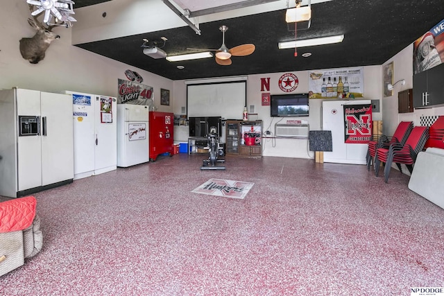 13952 Frederick Cir, Omaha, NE 68138 - garage featuring white refrigerator with ice dispenser and freestanding refrigerator