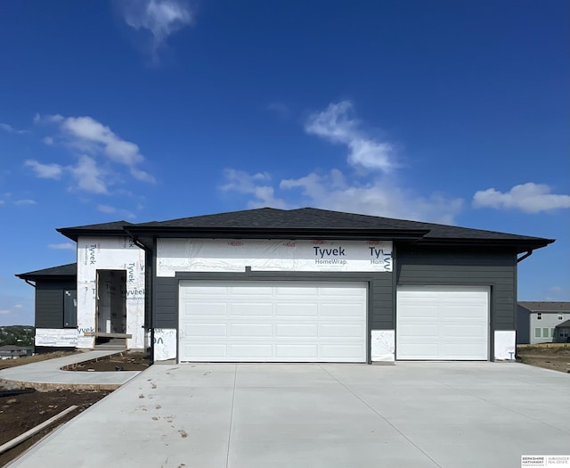 10915 N 161st Ave, Bennington, NE 68007 - view of front of home featuring an attached garage and concrete driveway
