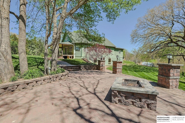 5531 County Road 34, Fort Calhoun, NE 68023 - view of patio / terrace featuring an outdoor fire pit