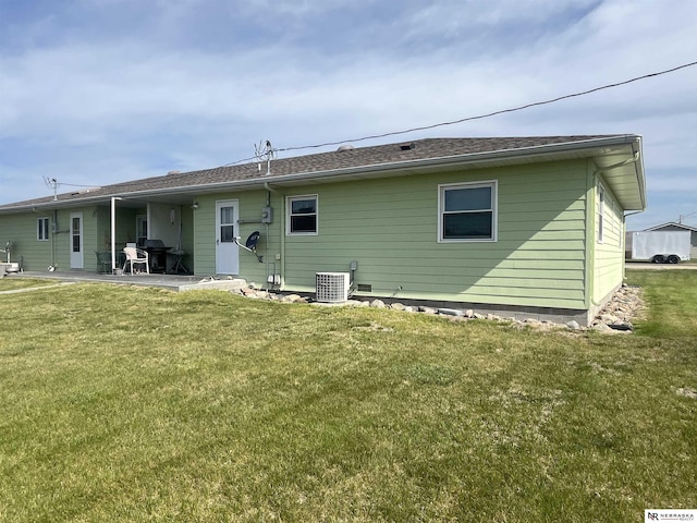 901 E 9th St, Valentine, NE 69201 - rear view of property with a yard, a patio area, and central air condition unit