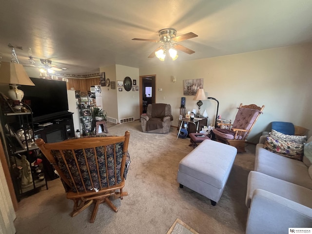 901 E 9th St, Valentine, NE 69201 - living room with ceiling fan and light colored carpet