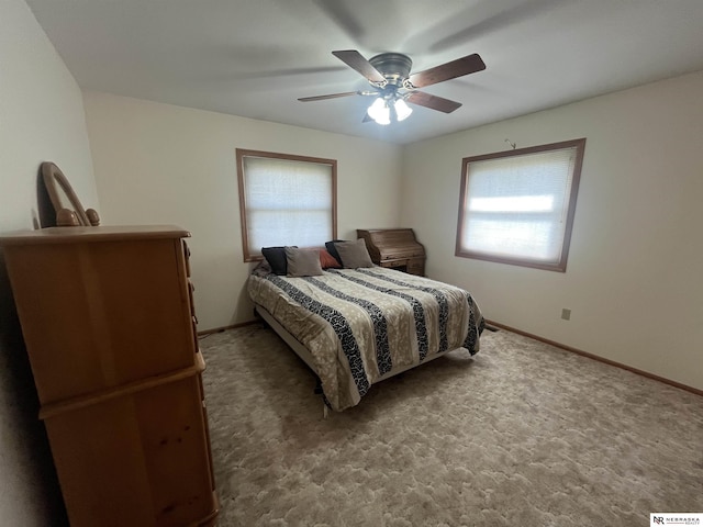901 E 9th St, Valentine, NE 69201 - bedroom featuring baseboards, carpet flooring, and a ceiling fan