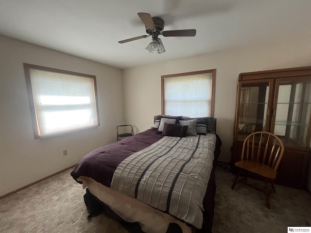 901 E 9th St, Valentine, NE 69201 - bedroom with carpet flooring, ceiling fan, and baseboards