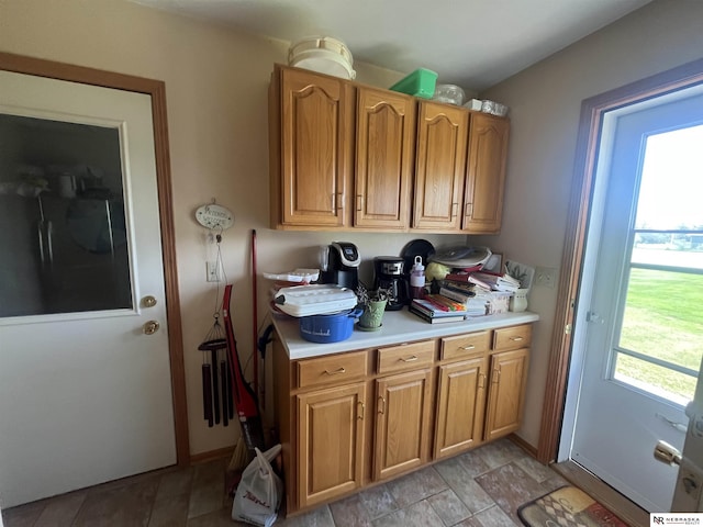 901 E 9th St, Valentine, NE 69201 - kitchen with light countertops and brown cabinetry