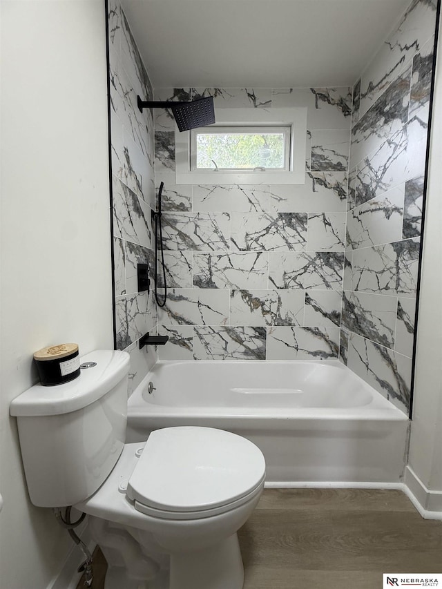 914 S 26th St, Omaha, NE 68105 - bathroom featuring  shower combination, toilet, and wood finished floors