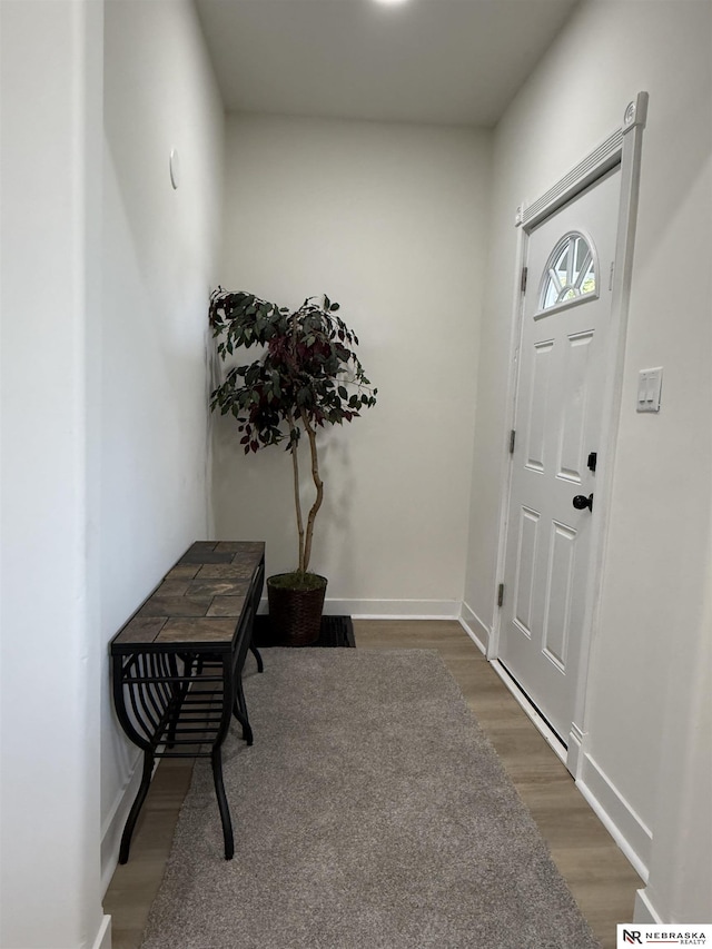 914 S 26th St, Omaha, NE 68105 - foyer with wood finished floors and baseboards