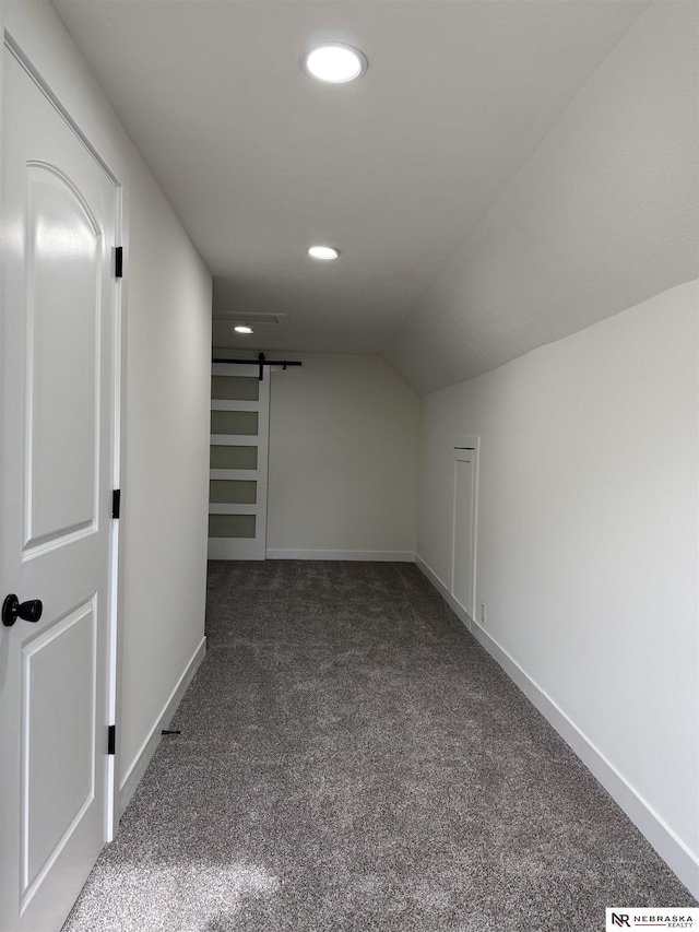 914 S 26th St, Omaha, NE 68105 - bonus room with a barn door, carpet floors, recessed lighting, baseboards, and vaulted ceiling