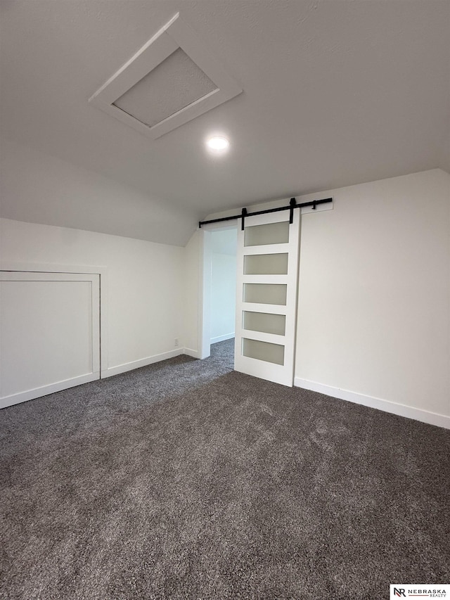 914 S 26th St, Omaha, NE 68105 - below grade area featuring dark carpet, baseboards, and recessed lighting