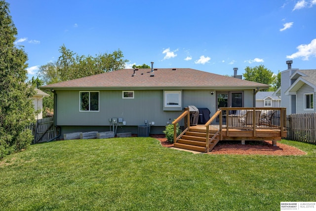 14014 S 35th St, Bellevue, NE 68123 - back of property with a deck, cooling unit, and roof with shingles