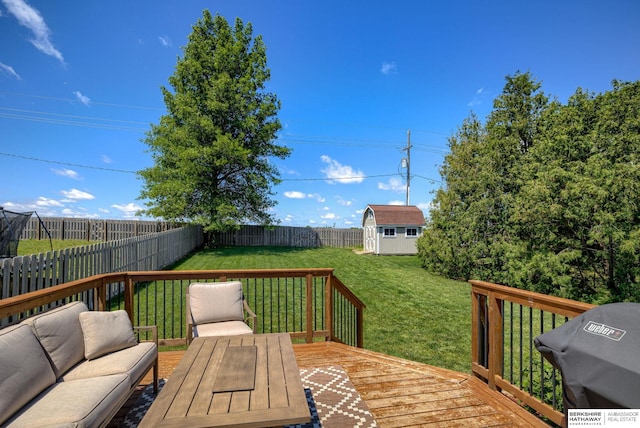 14014 S 35th St, Bellevue, NE 68123 - wooden deck with grilling area, an outbuilding, and an outdoor hangout area