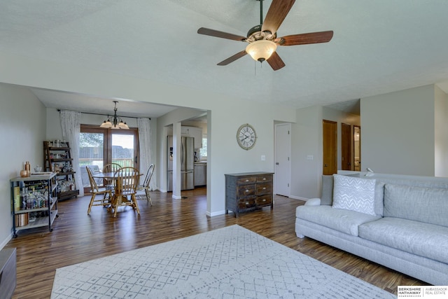 14014 S 35th St, Bellevue, NE 68123 - living room featuring a chandelier, dark wood-style floors, a ceiling fan, and baseboards