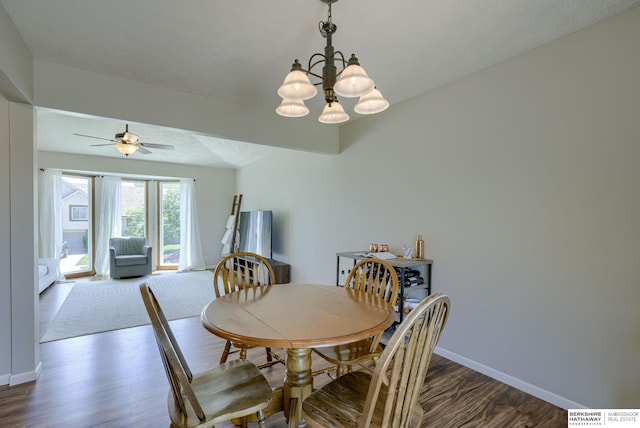 14014 S 35th St, Bellevue, NE 68123 - dining room with a chandelier, wood finished floors, ceiling fan, and baseboards