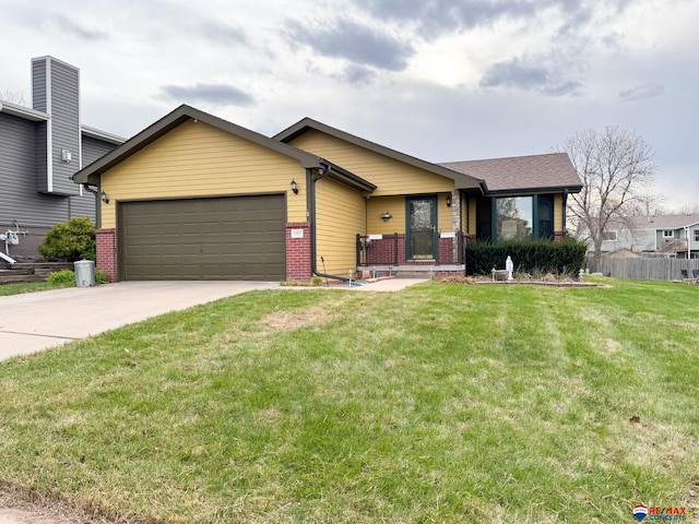 1507 SW 13th St, Lincoln, NE 68522 - view of front of property featuring an attached garage, brick siding, and driveway